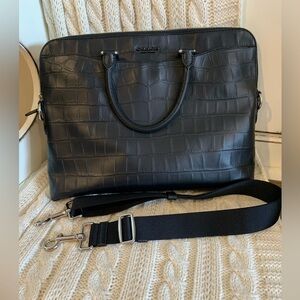 COACH Beckett portfolio
Large croco clutch sold separately in my closet.